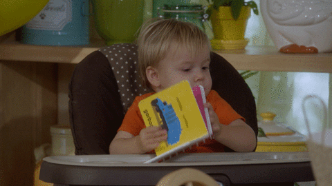 baby-throwing-book.gif