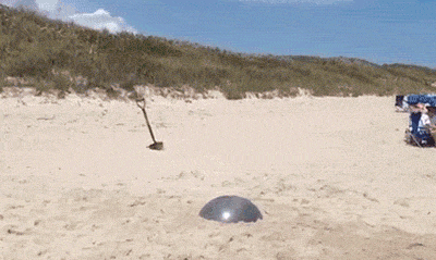 Jump-on-Exercise-Ball-into-Sand-Fail.gif