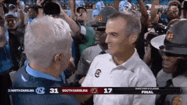 mack-brown-shane-beamer.gif