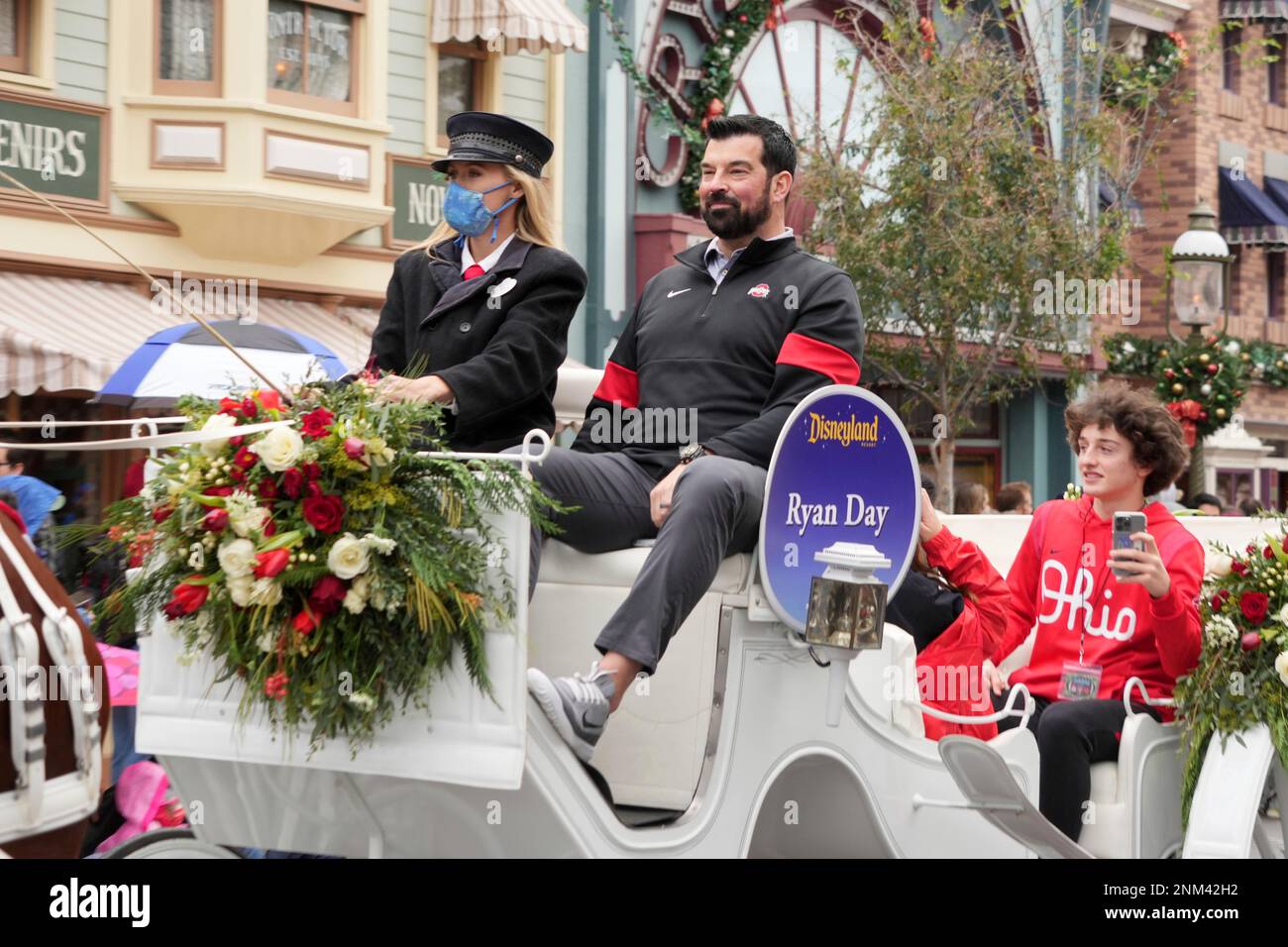 ohio-state-buckeys-coach-ryan-day-rides-in-a-carriage-during-rose-bowl-team-visit-at-disneyland-monday-dec-27-2021-in-anaheim-calif-kirby-lee-via-ap-2NM42H2.jpg