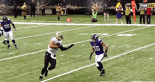 jimmy-graham-stiff-arm-against-minnesota-b.gif
