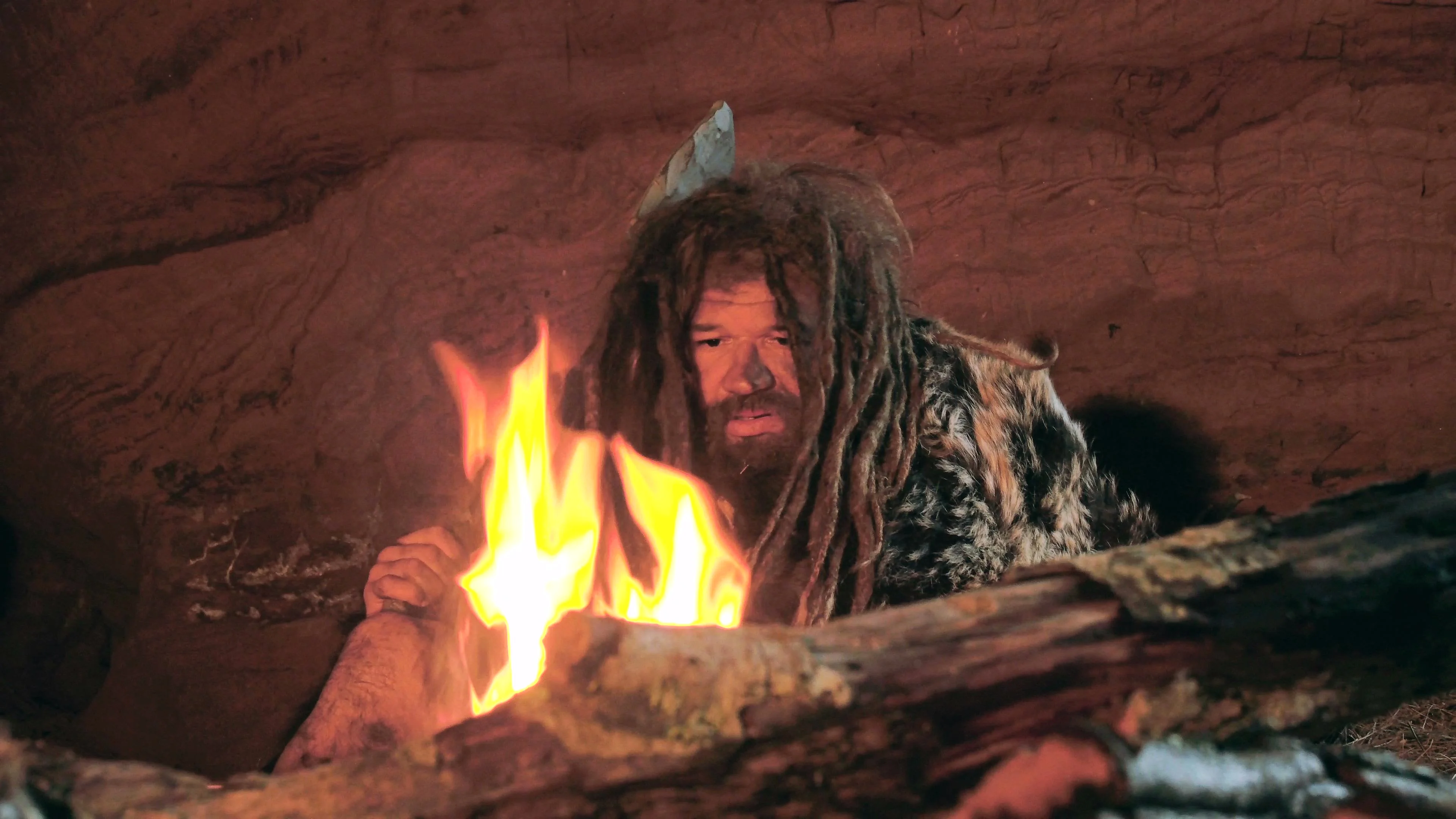 prehistoric-caveman-looks-fire-and-069912149_prevstill.jpeg