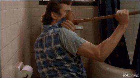 jim-carrey-ace-ventura-plunger-sick-gross-4-1.gif