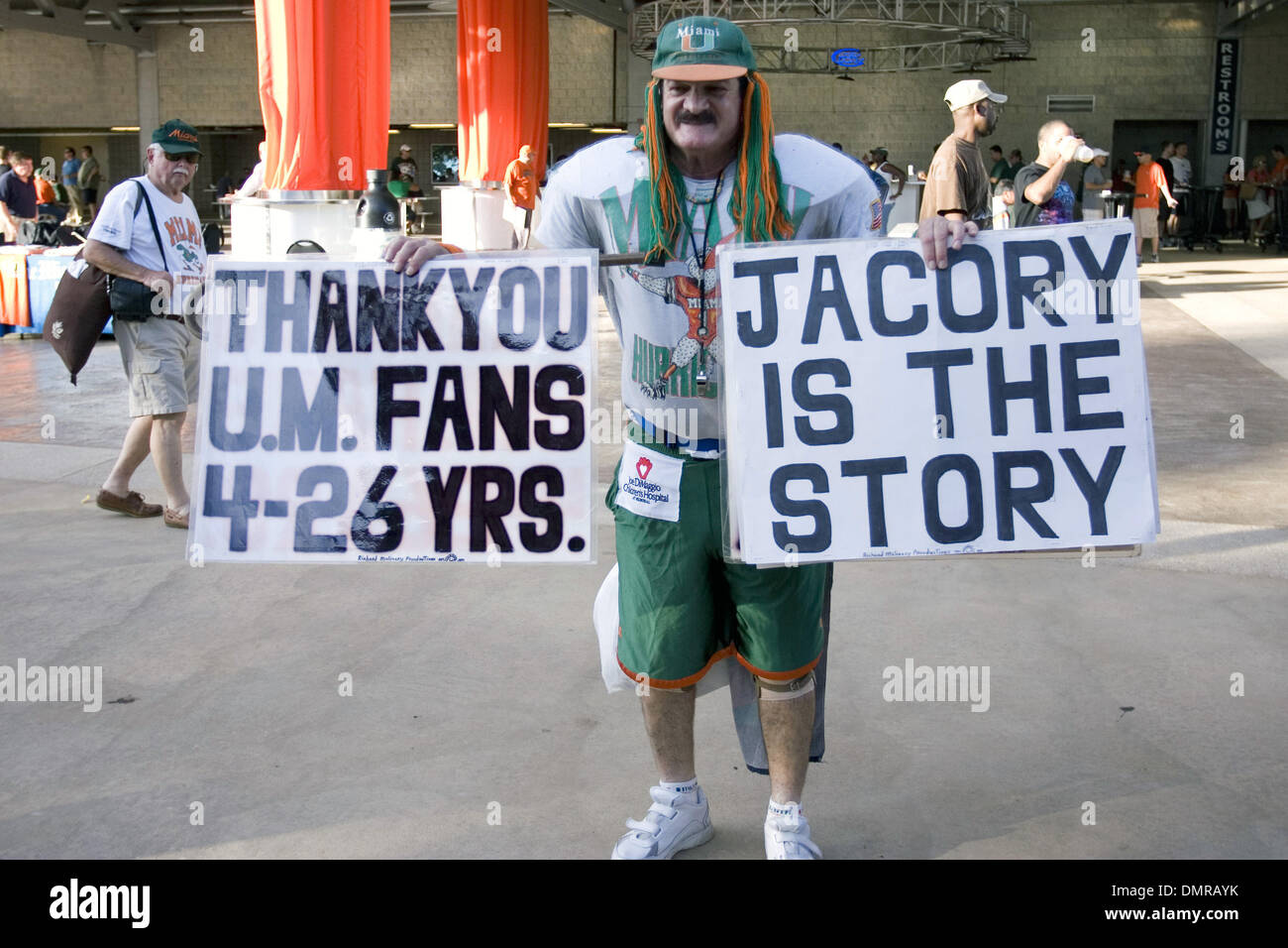 a-fan-with-his-signs-before-the-games-the-miami-hurricanes-defeated-DMRAYK.jpg