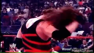 Kane Removes His Mask and show His Burning face on Make a GIF