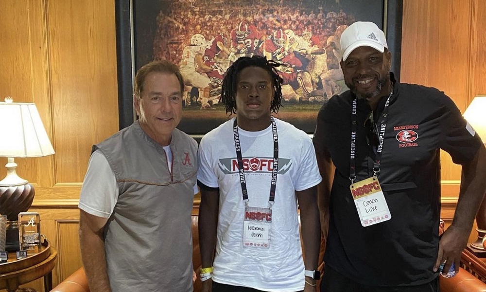 Nathaniel-Joseph-poses-for-picture-with-Nick-Saban-and-Uncle-Luke-1.jpg