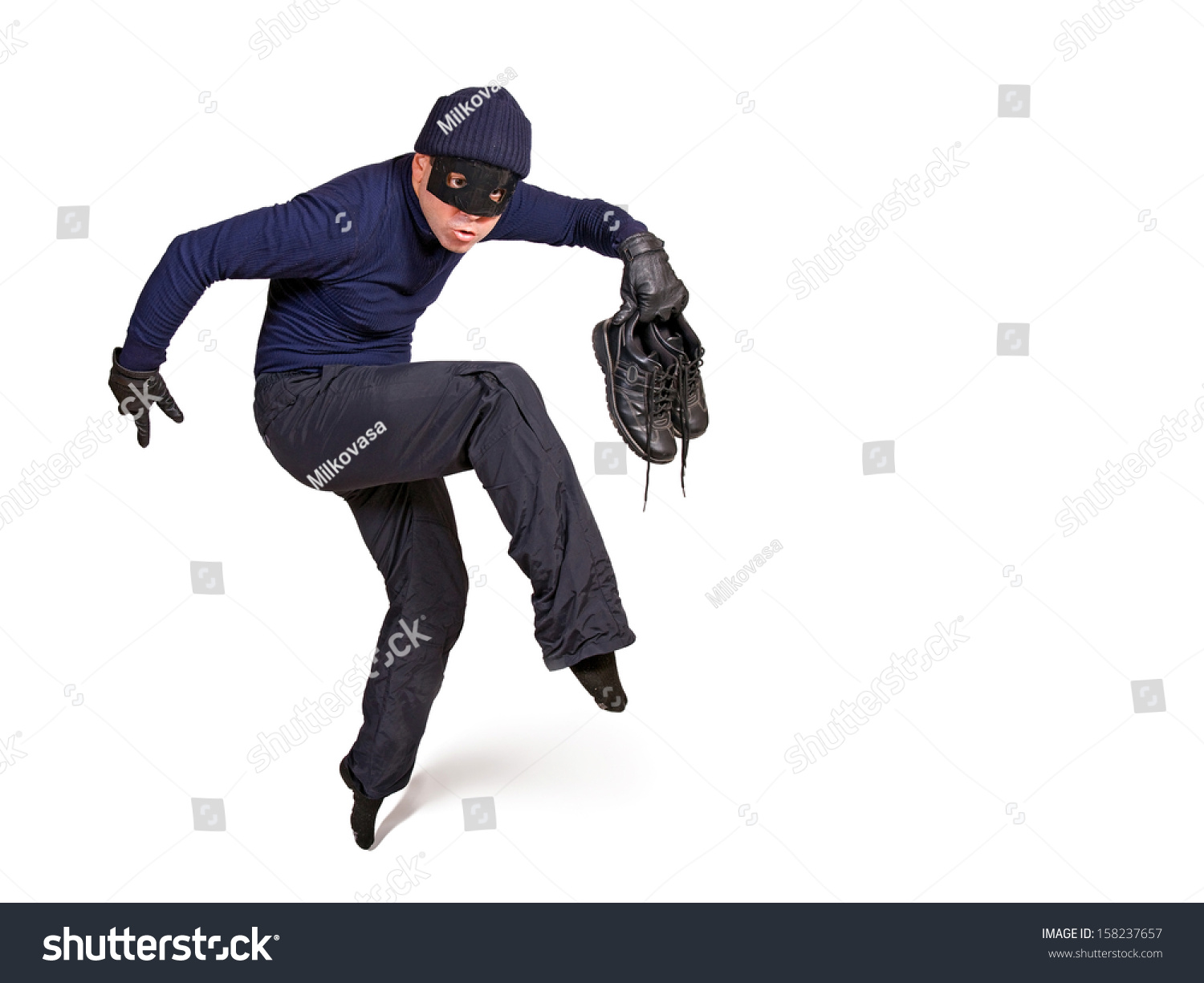 stock-photo-thief-walking-on-tiptoe-burglar-with-a-mask-on-his-face-walking-quietly-isolated-on-a-white-158237657.jpg