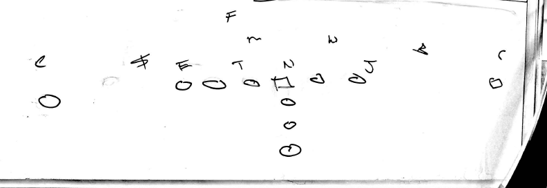A close-up of a handwritten crosswordDescription automatically generated