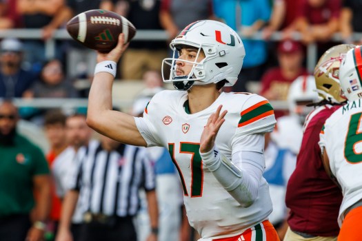 Miami quarterback Emory Williams looks to pass during the first half of an NCAA college football game against Florida State, Saturday, Nov. 11, 2023, in Tallahassee, Fla. (AP Photo/Colin Hackley)